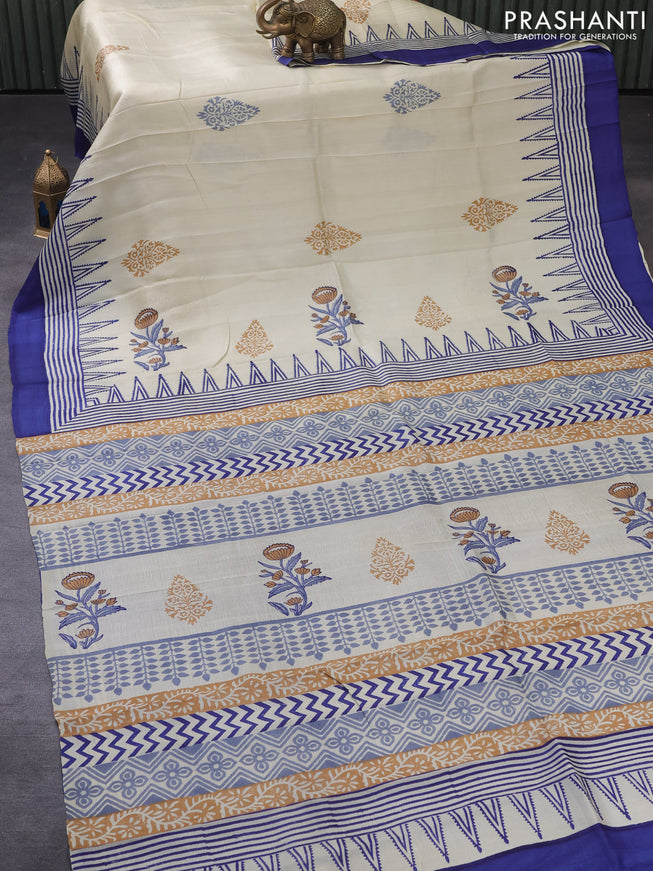 Bishnupuri silk saree cream and blue with plain body and temple design simple border