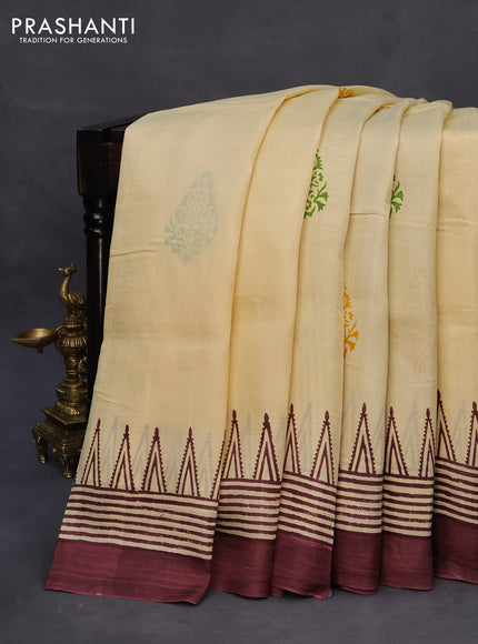 Bishnupuri silk saree cream and deep maroon with plain body and temple design simple border