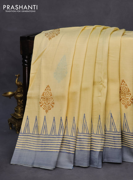 Bishnupuri silk saree cream and grey with plain body and temple design simple border