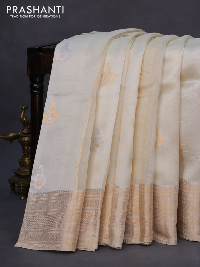 Banarasi organza silk saree cream with zari weaves & buttas and zari woven border