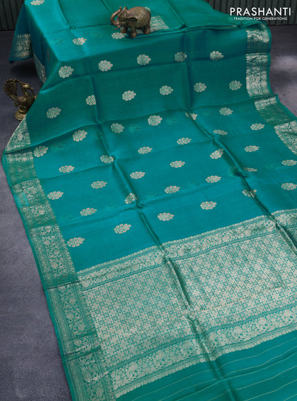 Banarasi organza silk saree teal green shade with zari woven buttas and zari woven border