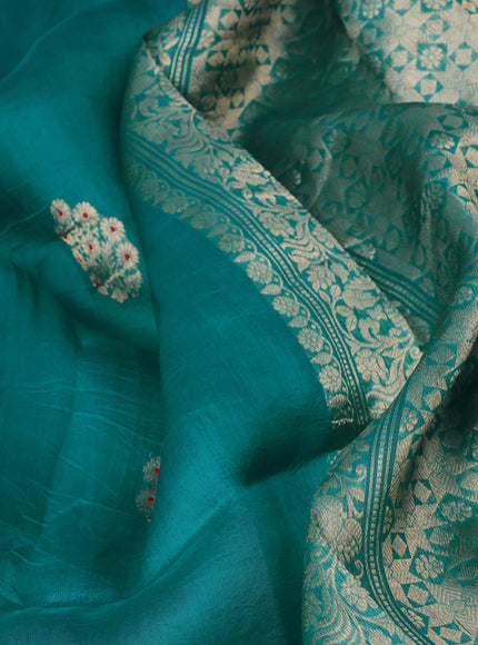 Banarasi organza silk saree teal green shade with zari woven buttas and zari woven border