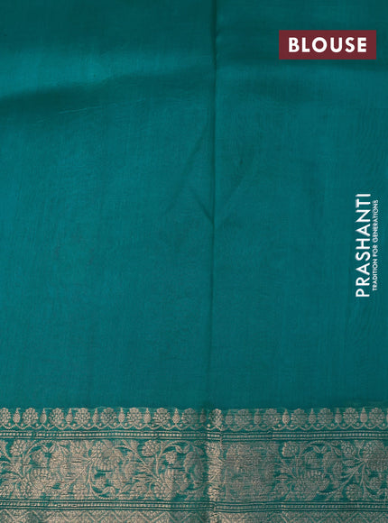 Banarasi organza silk saree teal green shade with zari woven buttas and zari woven border