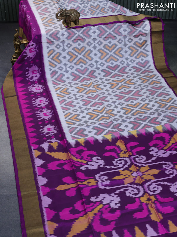 Ikat soft silk saree off white and purple with allover ikat weaves and long ikat woven zari border