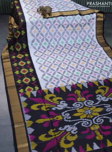 Ikat soft silk saree off white and black with allover ikat weaves and long ikat woven zari border