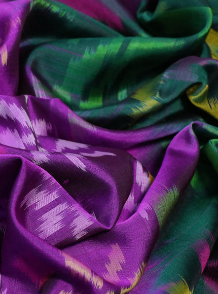 Ikat soft silk saree purple and dark green with allover ikat weaves and long ikat woven silver zari border