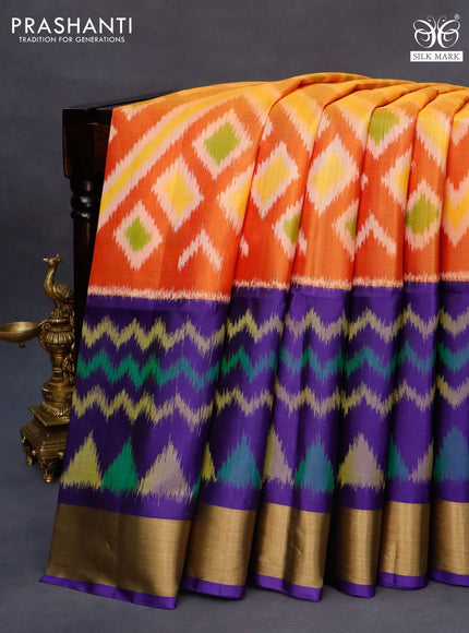 Ikat soft silk saree orange and blue with allover ikat weaves and long ikat woven zari border