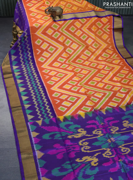 Ikat soft silk saree orange and blue with allover ikat weaves and long ikat woven zari border