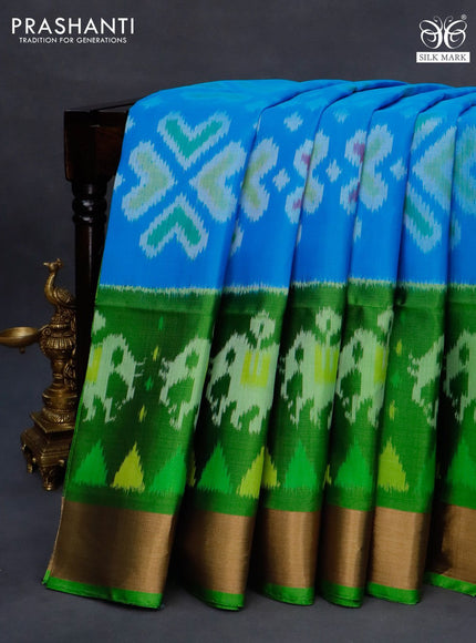 Ikat soft silk saree light blue and green with allover ikat weaves and long ikat woven zari border