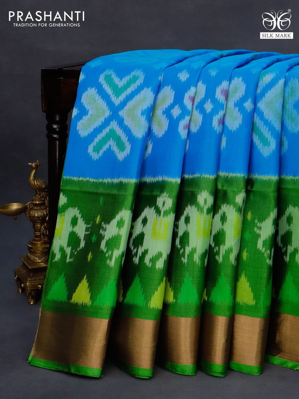 Ikat soft silk saree light blue and green with allover ikat weaves and long ikat woven zari border