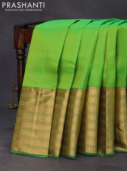 Pure kanchipuram silk saree light green with allover zari weaves and long zari woven border