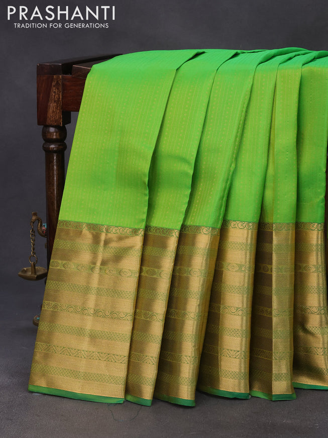 Pure kanchipuram silk saree light green with allover zari weaves and long zari woven border