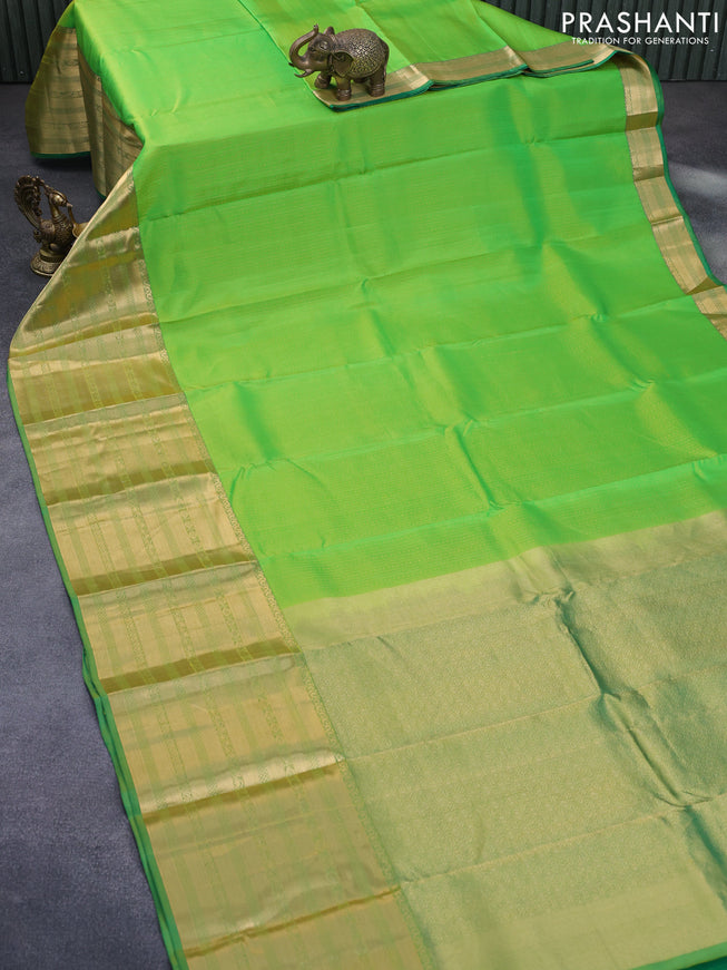 Pure kanchipuram silk saree light green with allover zari weaves and long zari woven border