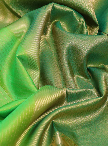 Pure kanchipuram silk saree light green with allover zari weaves and long zari woven border