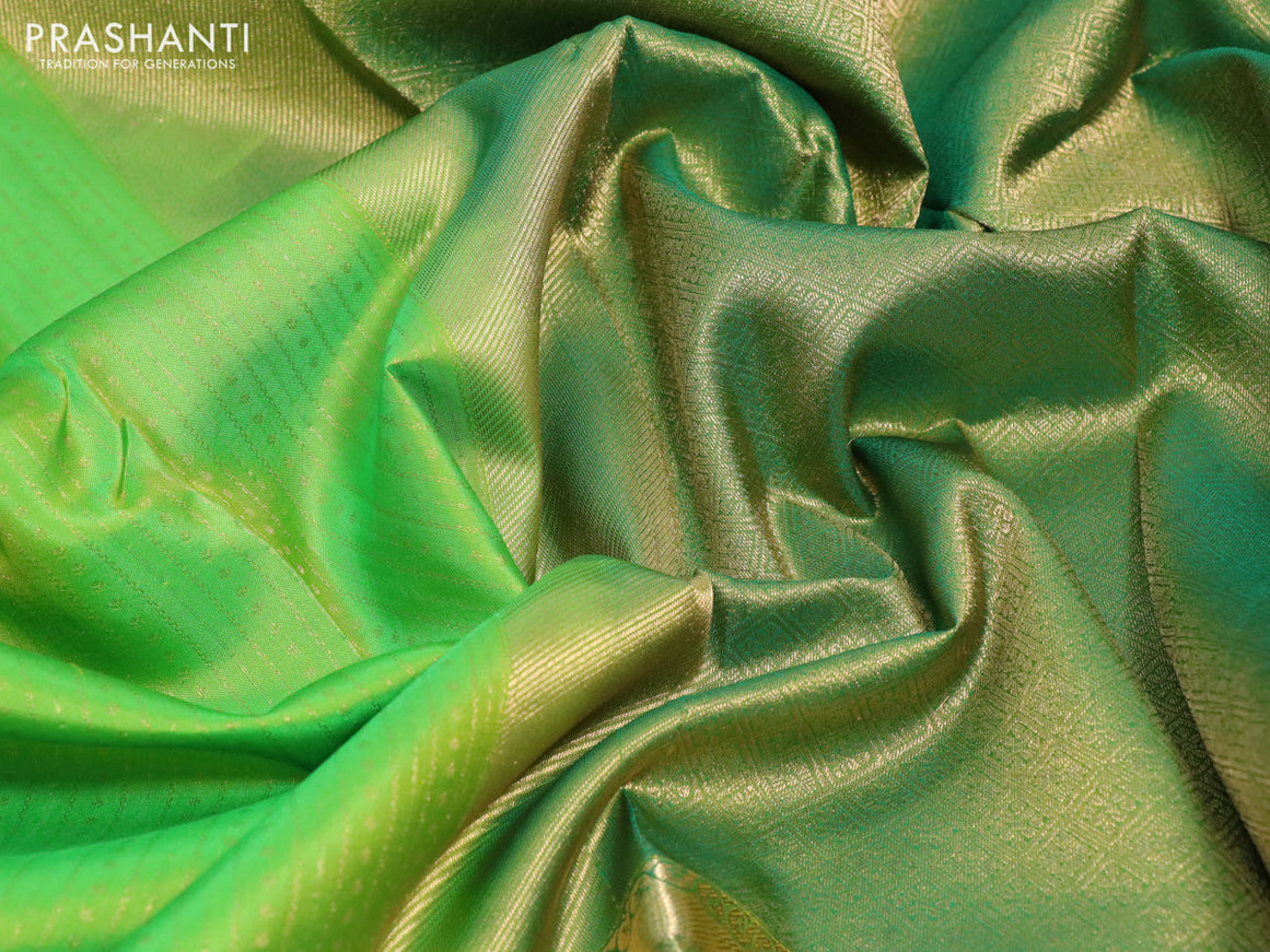 Pure kanchipuram silk saree light green with allover zari weaves and long zari woven border