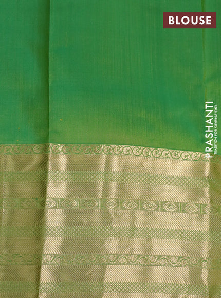 Pure kanchipuram silk saree light green with allover zari weaves and long zari woven border