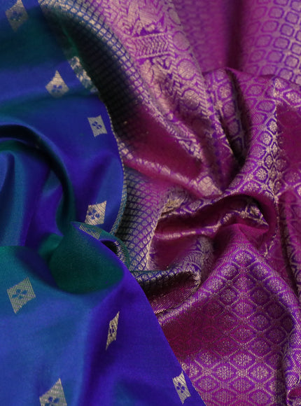 Pure kanchipuram silk saree dual shade of bluish green and purple with zari woven buttas and thread & zari woven border