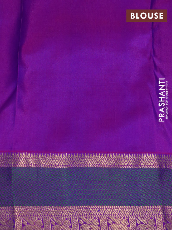 Pure kanchipuram silk saree dual shade of bluish green and purple with zari woven buttas and thread & zari woven border