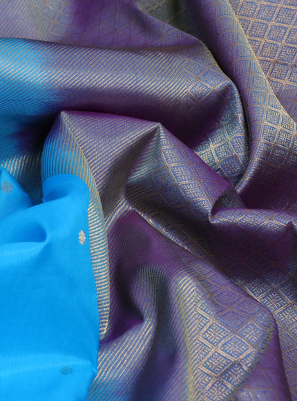 Pure kanchipuram silk saree light blue and dual shade of purple with zari woven buttas and zari woven border