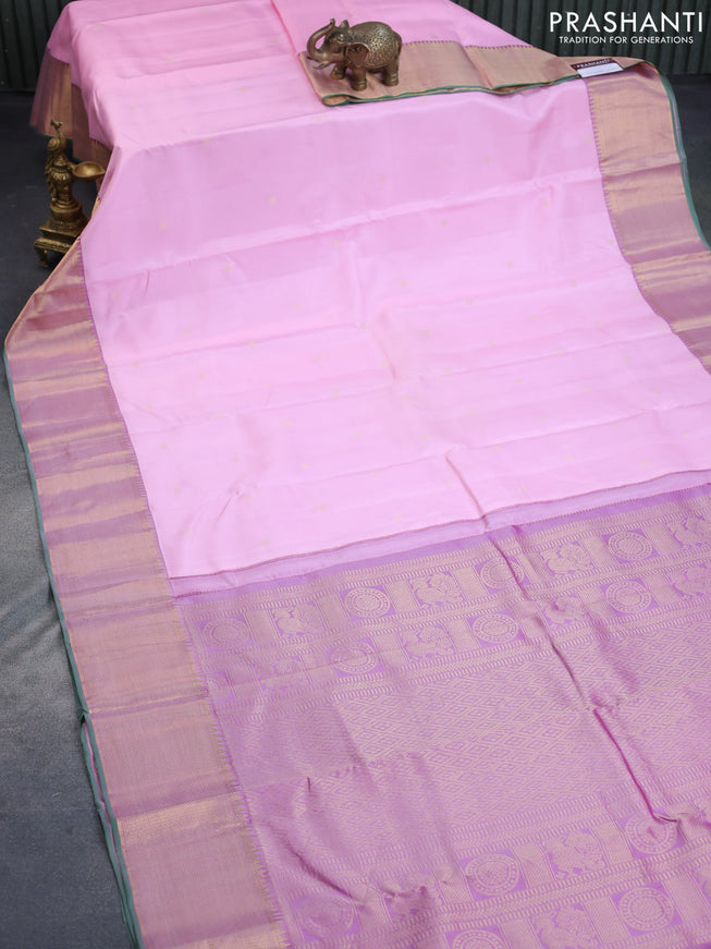 Pure kanchipuram silk saree light pink and dual shade of purple with zari woven buttas and rich zari woven border