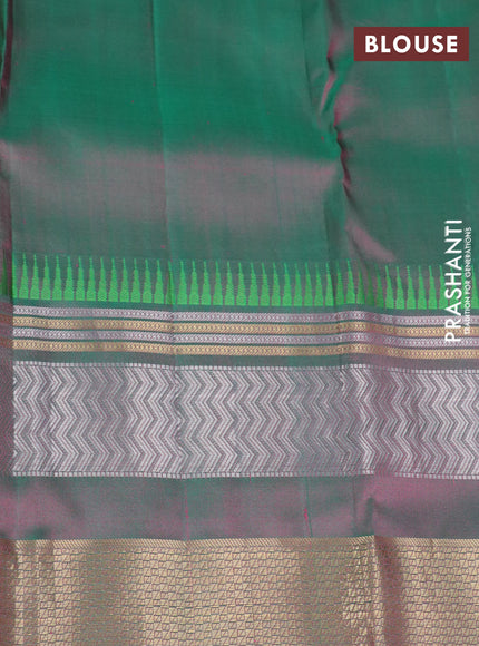 Pure kanchipuram silk saree dual shade of pinkish orange and dual shade of green with zari woven buttas and long zari woven border