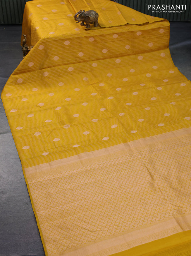 Pure kanchipuram silk saree mustard yellow with allover zari checks & buttas in borderless style