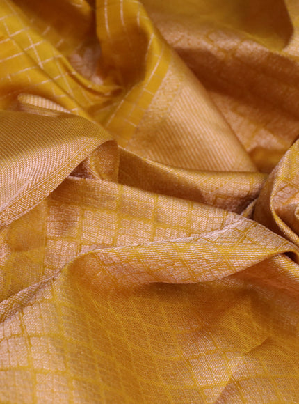 Pure kanchipuram silk saree mustard yellow with allover zari checks & buttas in borderless style