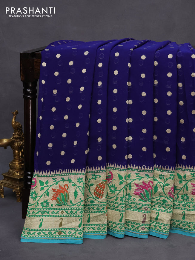 Banarasi georgette silk saree blue and teal blue with allover zari woven buttas and zari woven peacock design zari woven paithani border