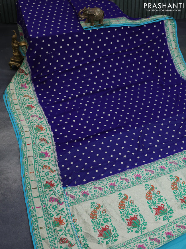 Banarasi georgette silk saree blue and teal blue with allover zari woven buttas and zari woven peacock design zari woven paithani border