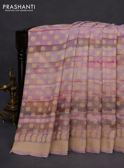 Banarasi georgette silk saree mild lavender shade and mild peach with allover zari woven buttas and zari woven border