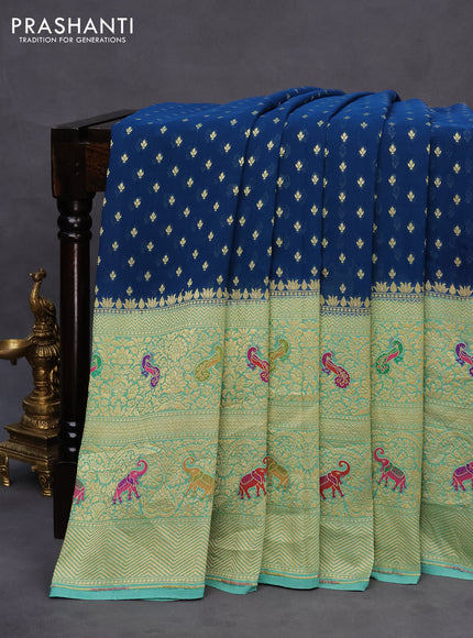 Banarasi georgette silk saree peacock blue and teal blue with zari woven buttas and long zari woven paithani border