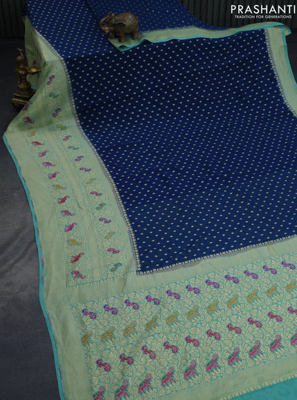 Banarasi georgette silk saree peacock blue and teal blue with zari woven buttas and long zari woven paithani border