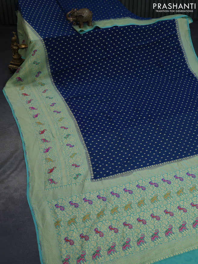 Banarasi georgette silk saree peacock blue and teal blue with zari woven buttas and long zari woven paithani border