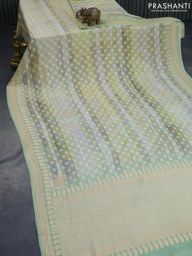 Banarasi georgette silk saree grey and mild pista green with allover zari woven buttas and zari woven border