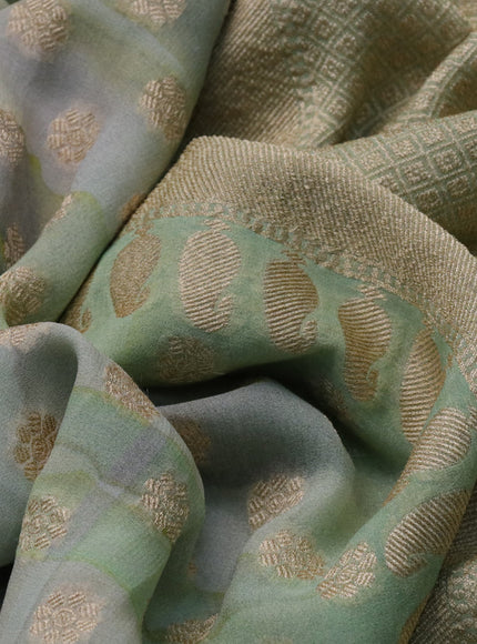 Banarasi georgette silk saree grey and mild pista green with allover zari woven buttas and zari woven border