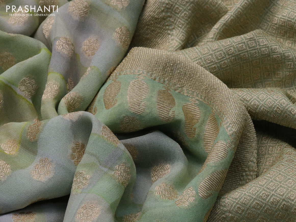 Banarasi georgette silk saree grey and mild pista green with allover zari woven buttas and zari woven border