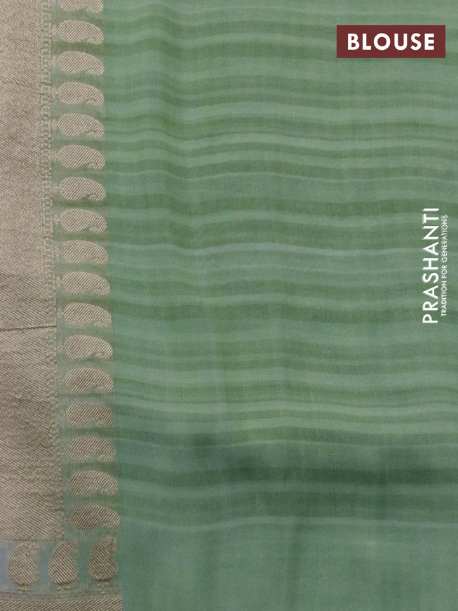 Banarasi georgette silk saree grey and mild pista green with allover zari woven buttas and zari woven border