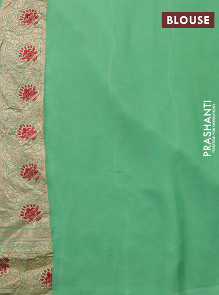 Banarasi georgette silk saree teal green with allover zari weaves & thread buttas and zari woven border