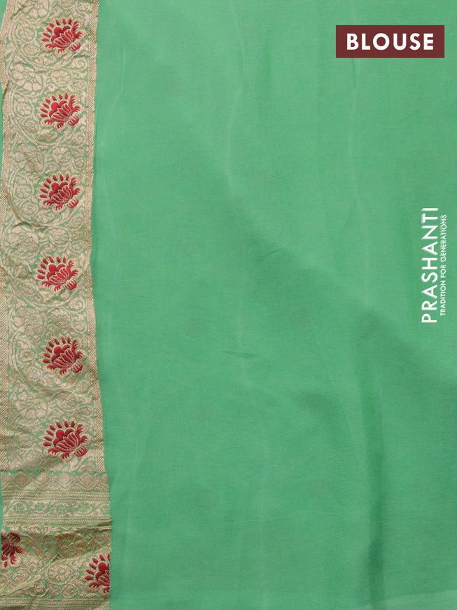 Banarasi georgette silk saree teal green with allover zari weaves & thread buttas and zari woven border