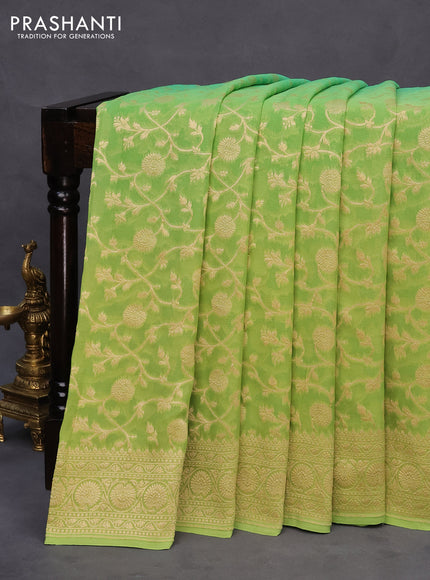 Banarasi georgette silk saree light green and teal green with allover zari woven weaves and zari woven border