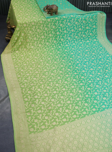 Banarasi georgette silk saree light green and teal green with allover zari woven weaves and zari woven border