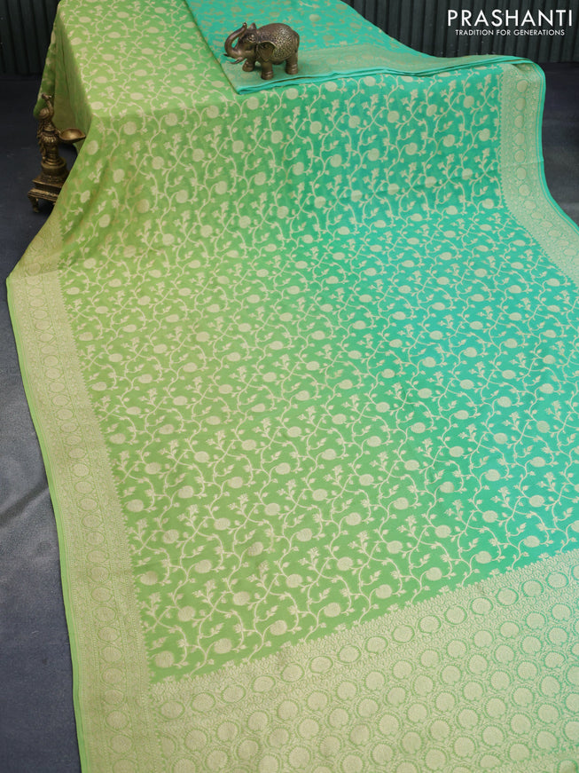 Banarasi georgette silk saree light green and teal green with allover zari woven weaves and zari woven border