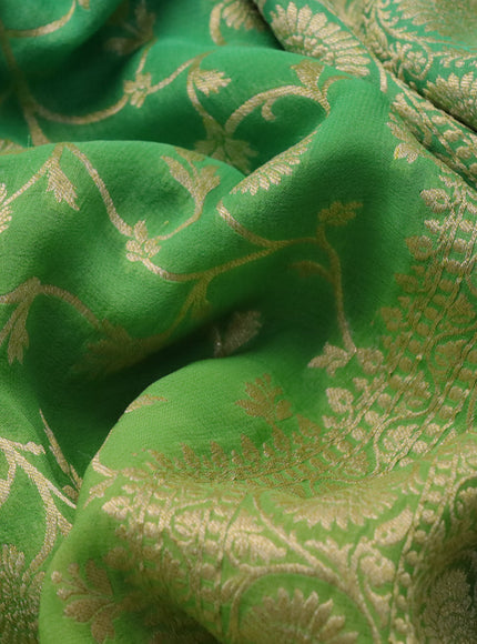 Banarasi georgette silk saree light green and teal green with allover zari woven weaves and zari woven border