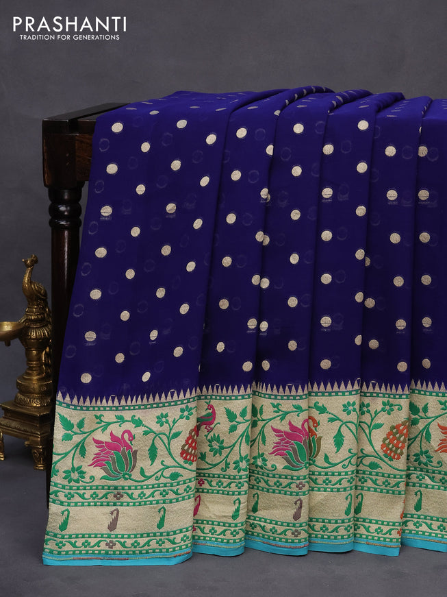 Banarasi georgette silk saree dark blue and teal blue with allover zari woven buttas and zari woven peacock design zari woven paithani border