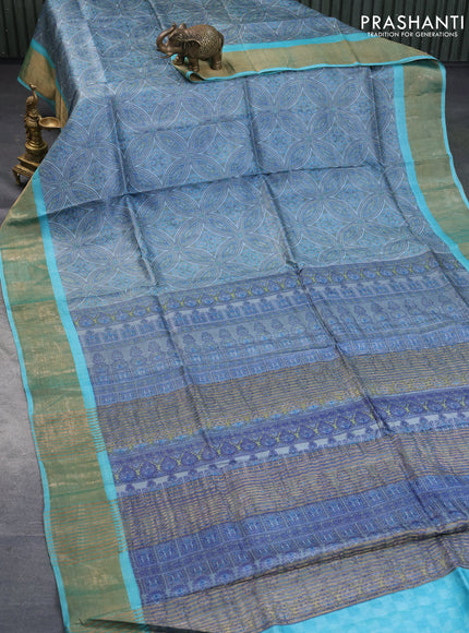 Pure tussar silk saree pastel grey and light blue with allover prints and zari woven border