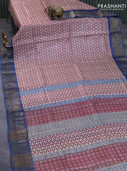 Pure tussar silk saree red off white and cs blue with allover prints and zari woven border