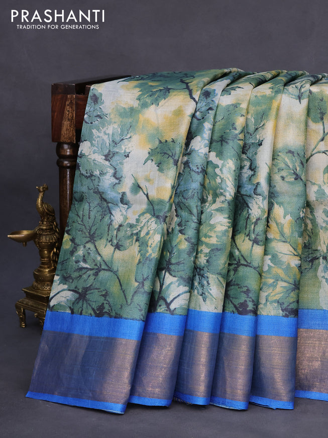 Pure tussar silk saree pastel blue shade and cs blue with allover leaf prints and zari woven border