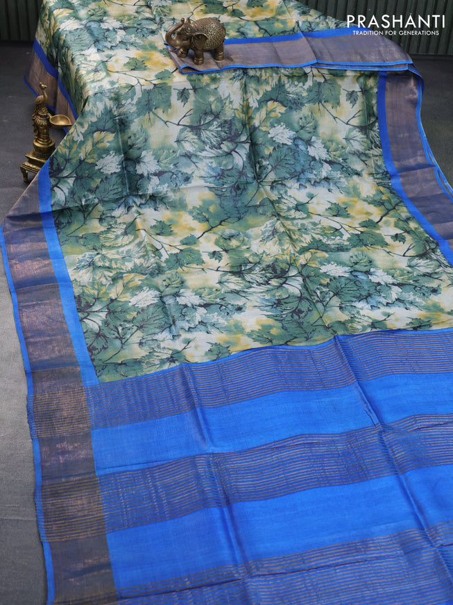 Pure tussar silk saree pastel blue shade and cs blue with allover leaf prints and zari woven border