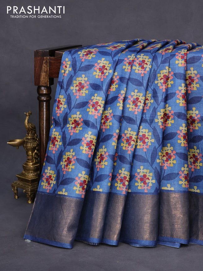 Pure tussar silk saree blue shade with allover floral prints and zari woven border