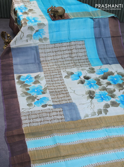 Pure tussar silk saree light blue and beige violet with hand painted prints and zari woven border